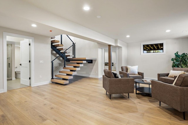 2291 Williams Point Dr, Stoughton, WI 53589 - living room with stairs, light wood-style flooring, baseboards, and recessed lighting
