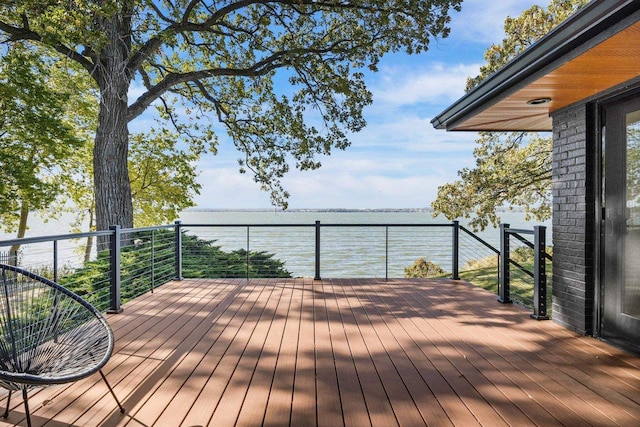 deck featuring a water view