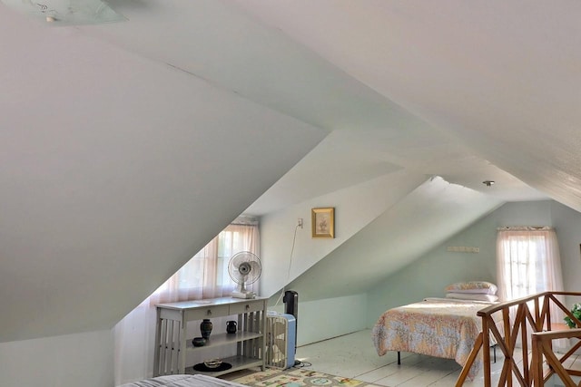 bedroom with vaulted ceiling