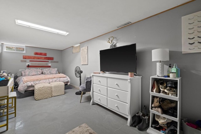 bedroom with concrete flooring