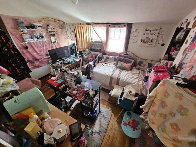 bedroom featuring hardwood / wood-style floors