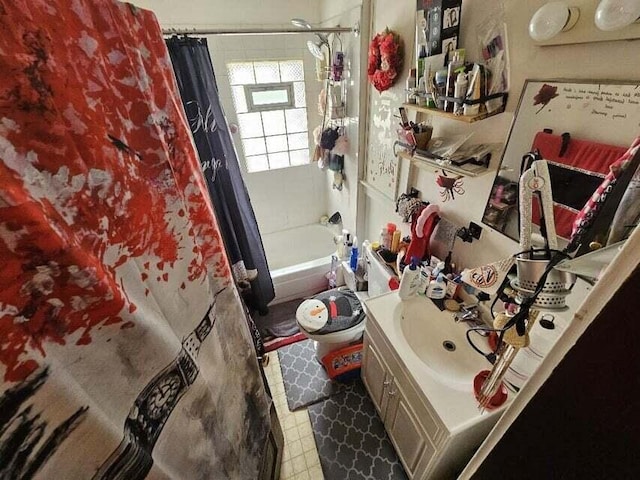 full bathroom featuring vanity, shower / tub combo with curtain, and toilet