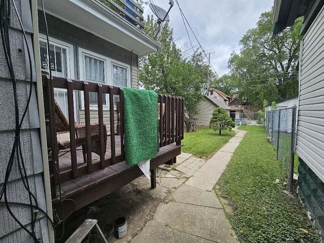 view of yard featuring a wooden deck