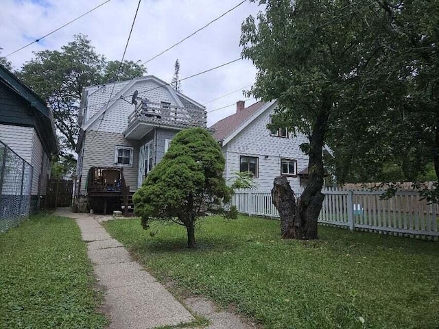 view of yard featuring a wooden deck