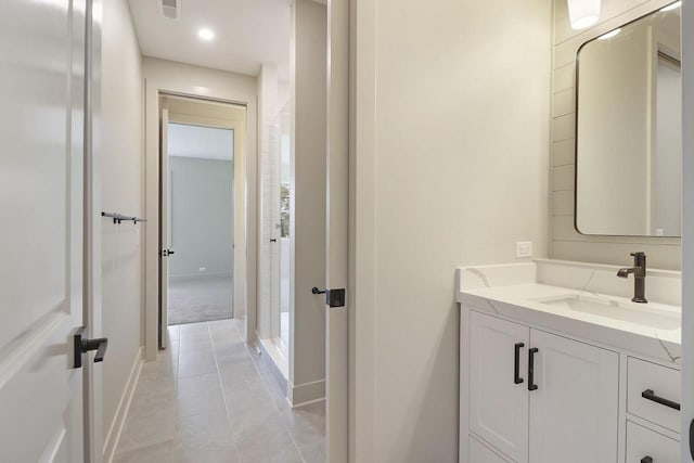 bathroom featuring vanity and tile patterned flooring