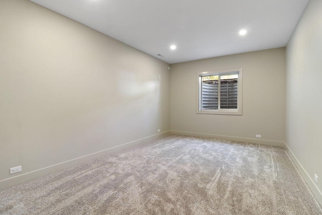 spare room with carpet floors