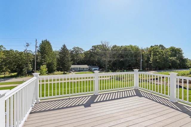 wooden deck with a yard