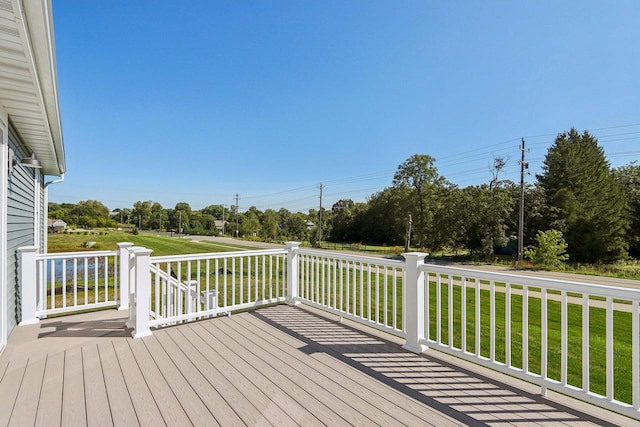 deck featuring a yard