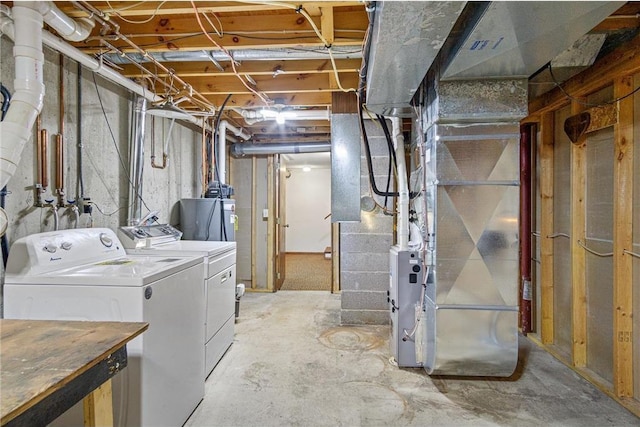 basement with washing machine and dryer