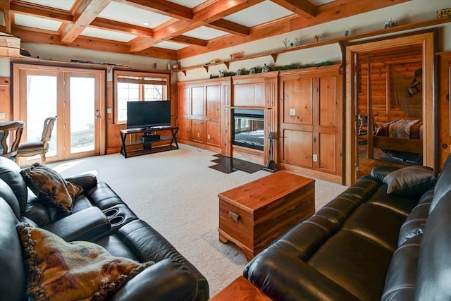 living room featuring light carpet, beam ceiling, and coffered ceiling