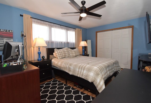 bedroom featuring a closet, ceiling fan, and hardwood / wood-style floors