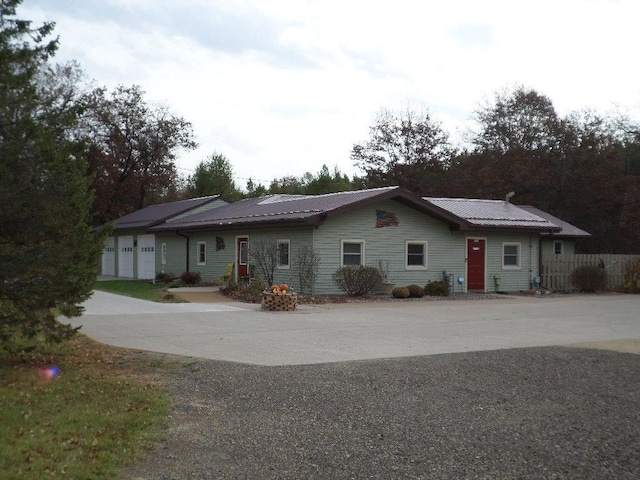 ranch-style home with a garage