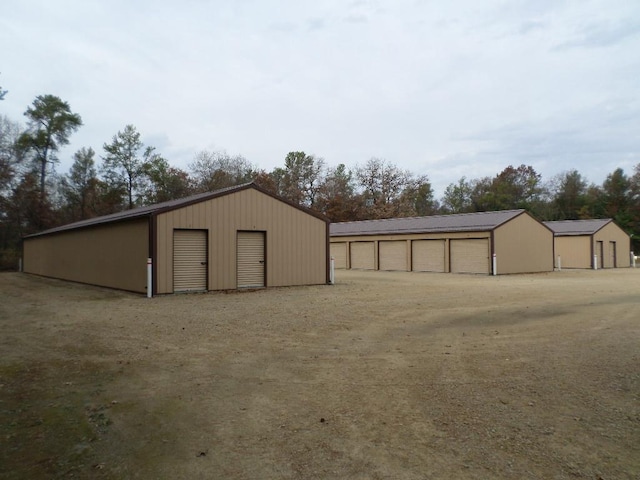 view of outbuilding featuring a garage