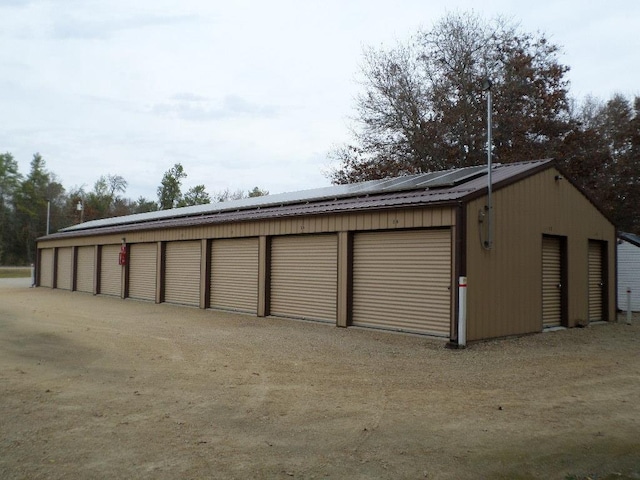 garage with solar panels