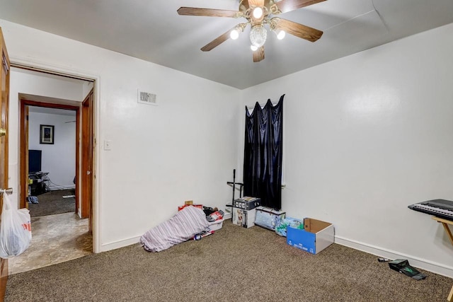 recreation room featuring carpet flooring and ceiling fan