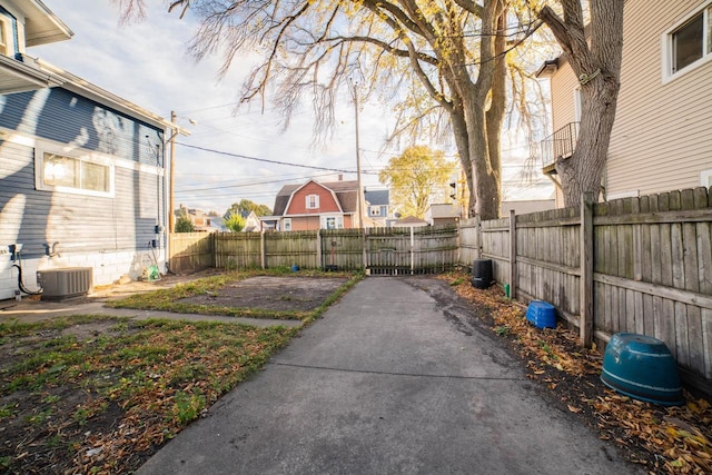 view of yard with central AC