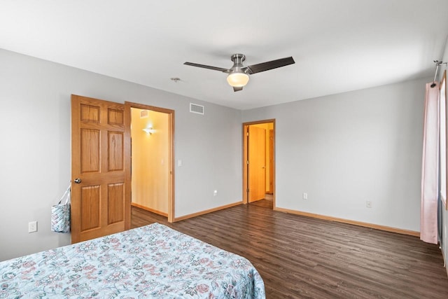 bedroom featuring dark hardwood / wood-style floors and ceiling fan