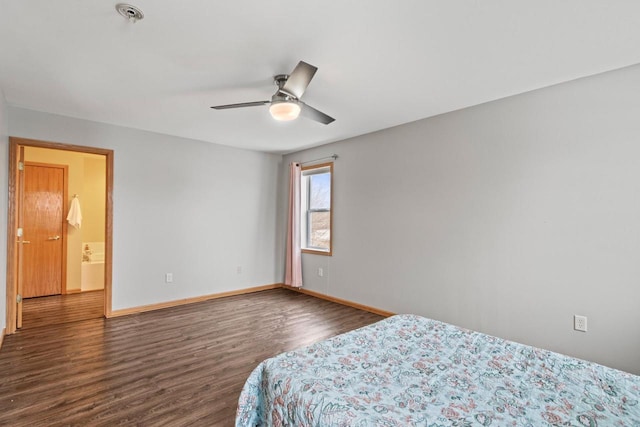 bedroom with ceiling fan and dark hardwood / wood-style floors