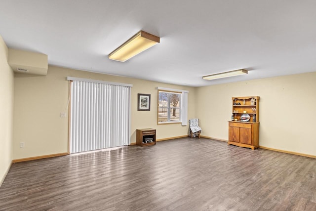 unfurnished room featuring hardwood / wood-style floors