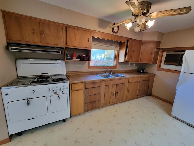 kitchen featuring extractor fan, ceiling fan, sink, and white appliances