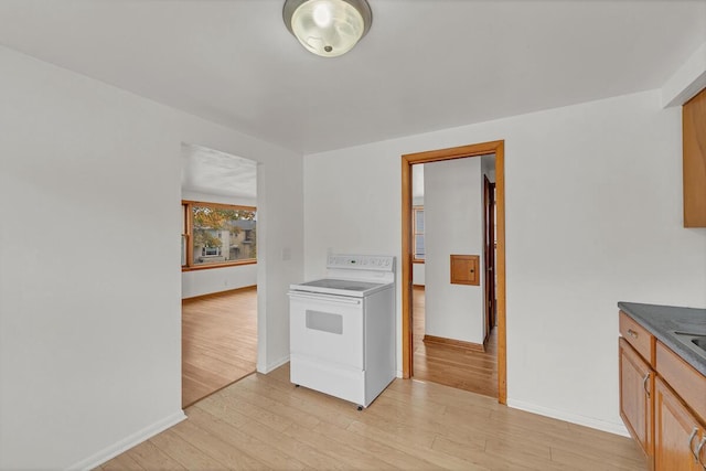 kitchen featuring light wood-type flooring and range