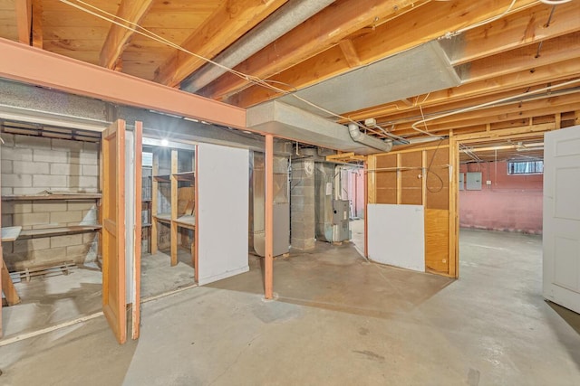 basement featuring heating unit