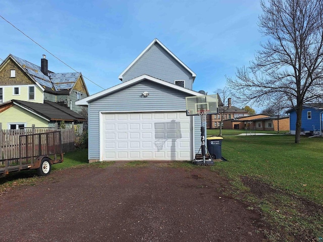 garage with a lawn