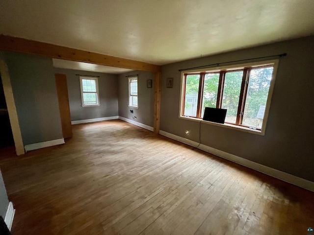 unfurnished room featuring light wood-type flooring