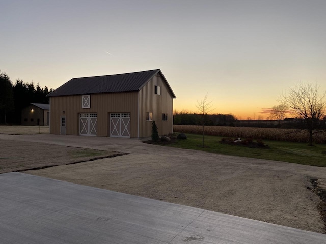 10823 Pleasant Valley Rd, Cedarburg, WI 53012 - view of barn with dirt driveway and a lawn