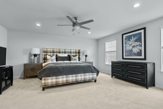 carpeted bedroom with ceiling fan