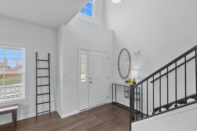 entrance foyer with dark wood-type flooring