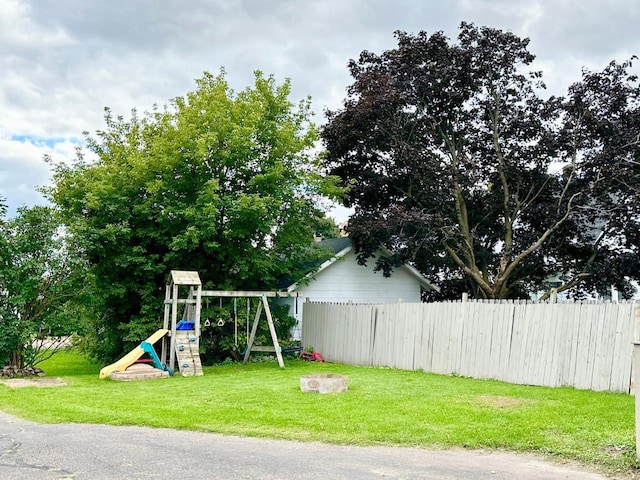 view of jungle gym with a yard