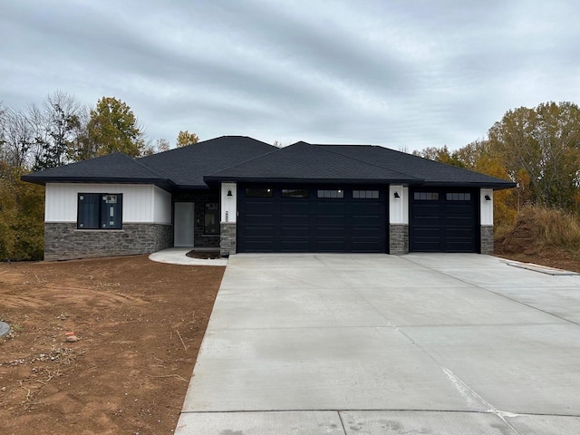 prairie-style house featuring a garage