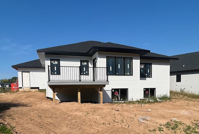 rear view of house with a deck