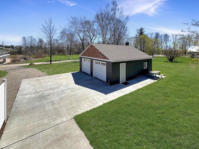 garage with a lawn