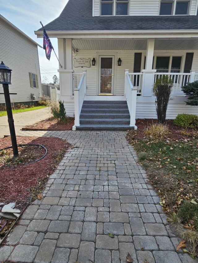 property entrance with a porch