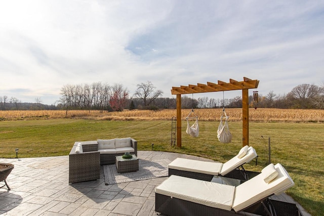 view of patio / terrace featuring outdoor lounge area and a rural view