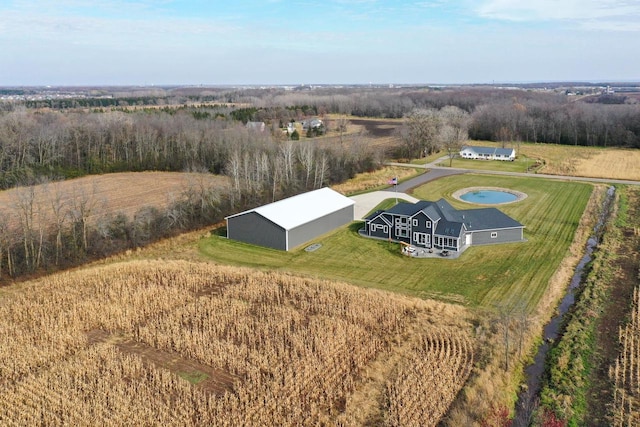 birds eye view of property with a rural view