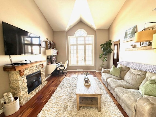 N4266 Cherokee Ct, Markesan, WI 53946 - living room with wood finished floors, vaulted ceiling, and baseboards