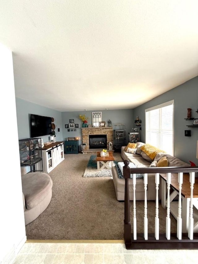 N4266 Cherokee Ct, Markesan, WI 53946 - living room with a glass covered fireplace and a textured ceiling