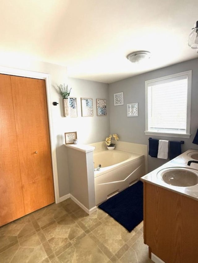 N4266 Cherokee Ct, Markesan, WI 53946 - full bathroom featuring a garden tub and vanity