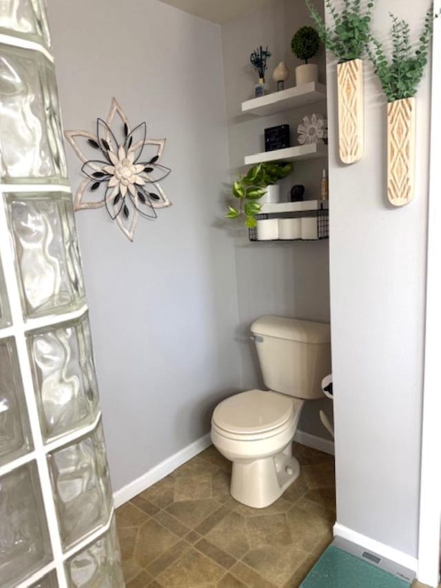 N4266 Cherokee Ct, Markesan, WI 53946 - bathroom with baseboards and toilet