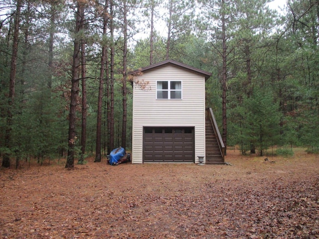 view of property exterior with a garage