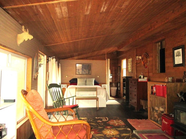 living area with lofted ceiling, dark wood-type flooring, wood ceiling, and wooden walls