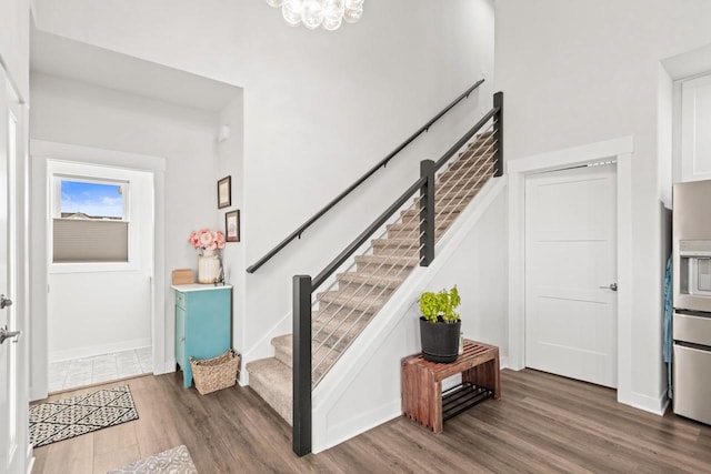 foyer entrance featuring dark hardwood / wood-style floors