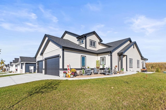 view of front facade with a front lawn and a garage