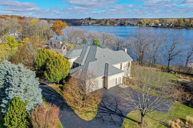 aerial view featuring a water view