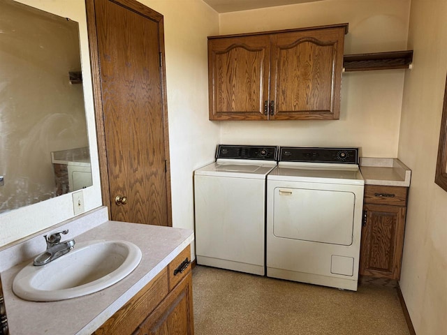 laundry room with sink and washer and clothes dryer