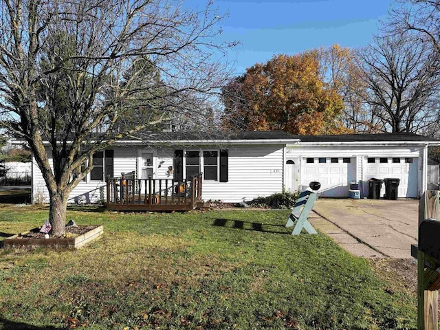 single story home with a front lawn, a deck, and a garage