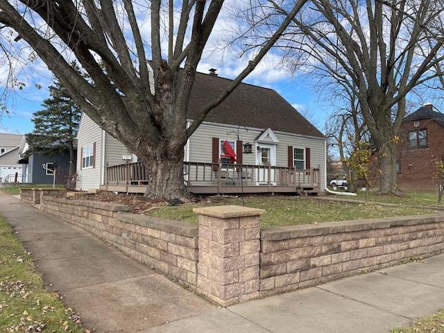 view of front of home with a wooden deck